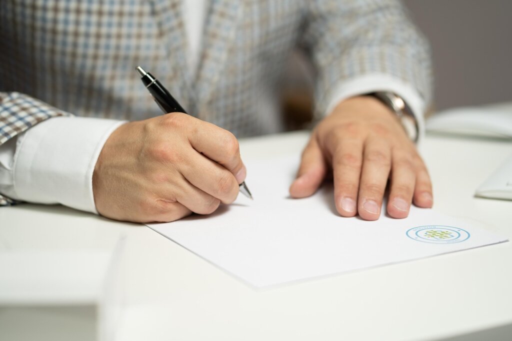 rental contract checklist document on wooden table