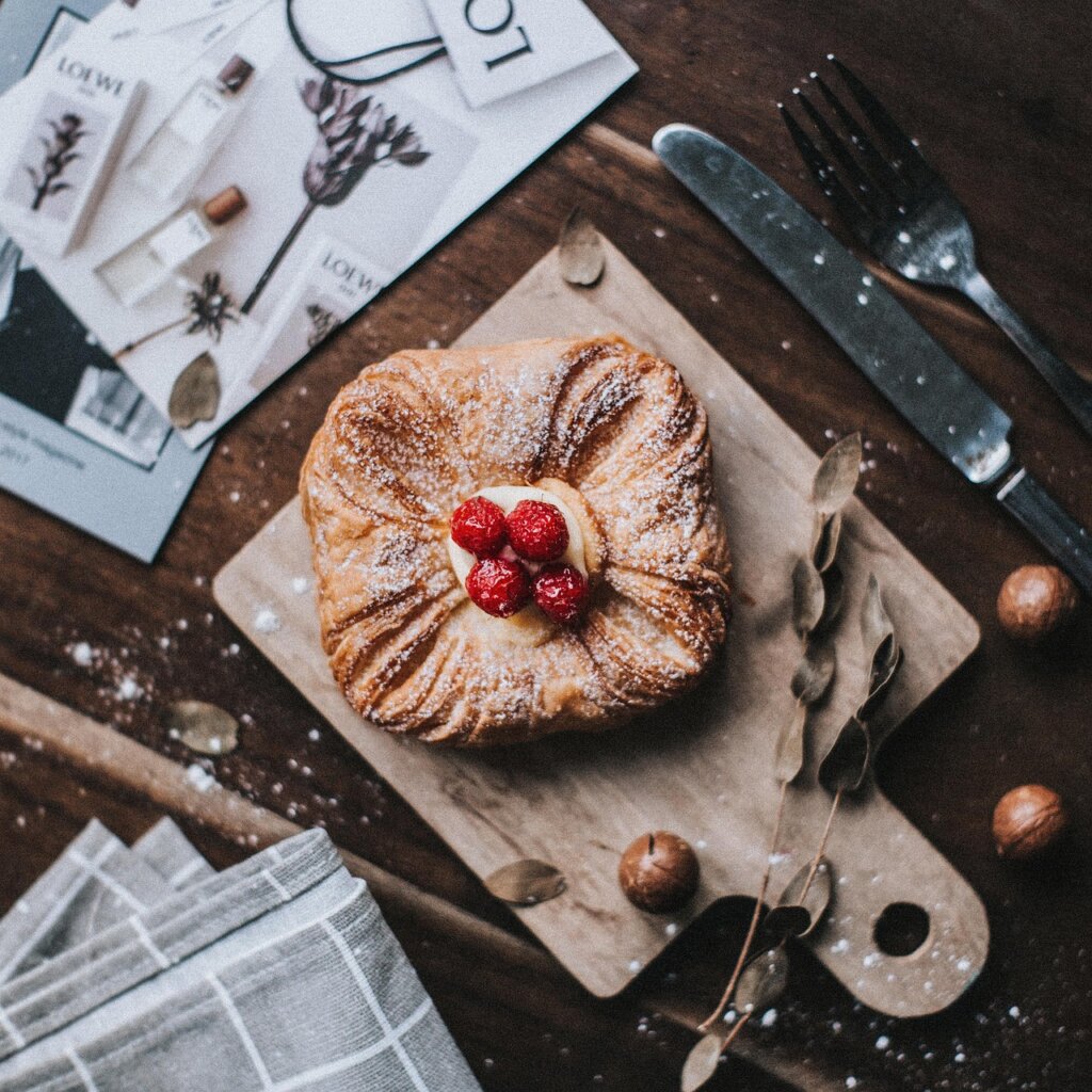 dirty wooden cutting board with knife marks close up
