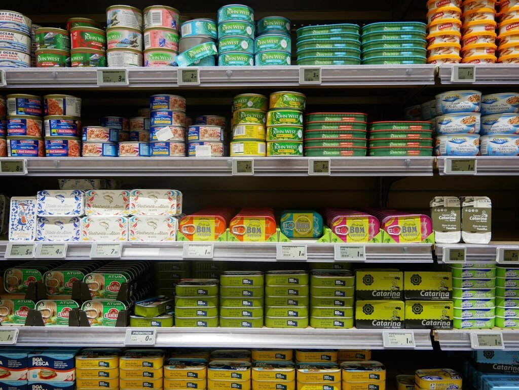 dehumidifier product labels being checked in a store