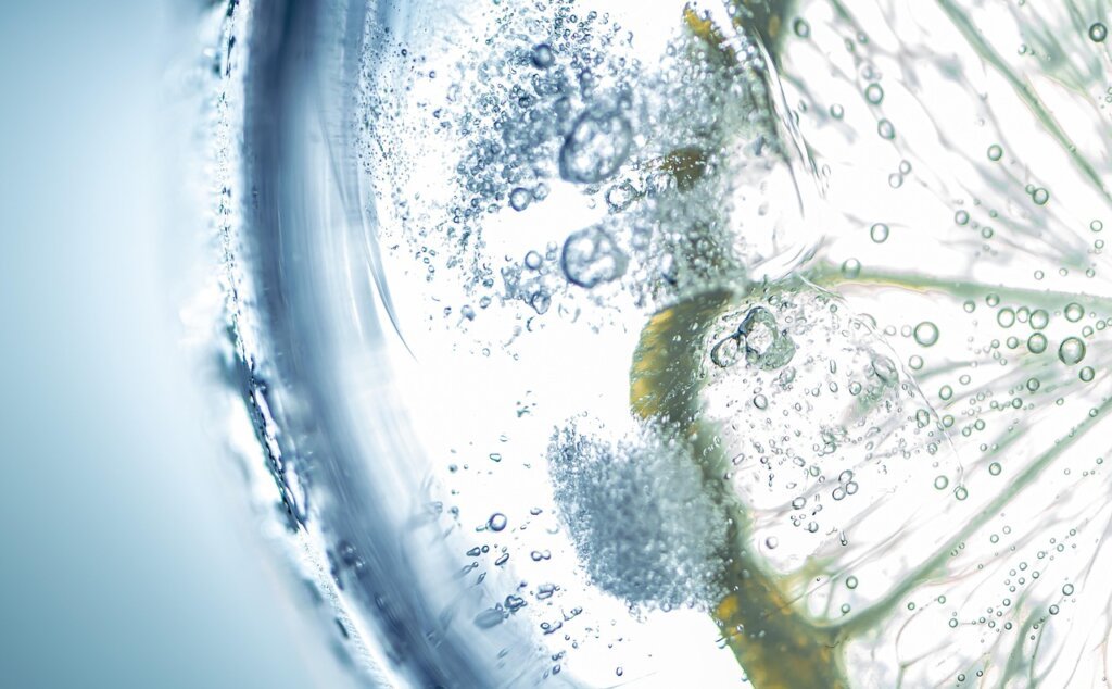 lemon and baking soda combined in pot with bubbles
