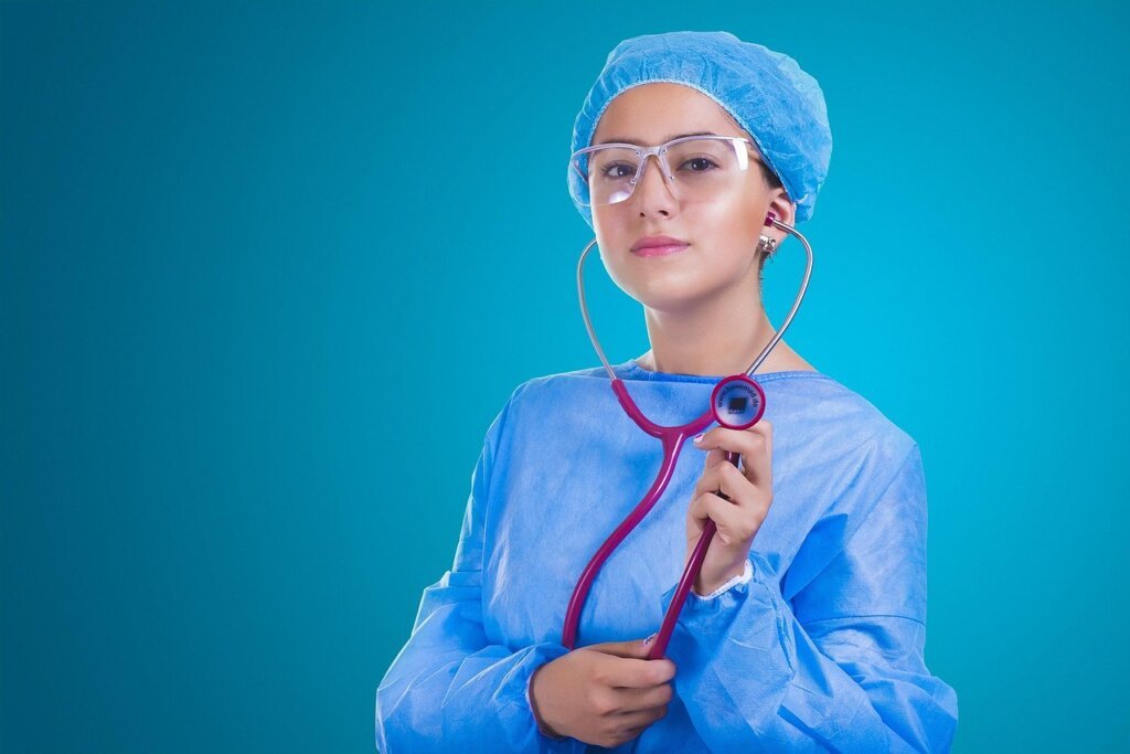 stained hospital uniform soaking in enzyme detergent