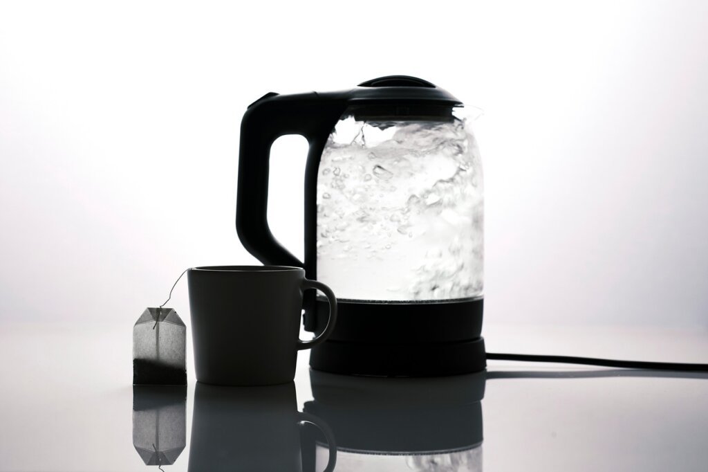 electric kettle with white limescale buildup inside