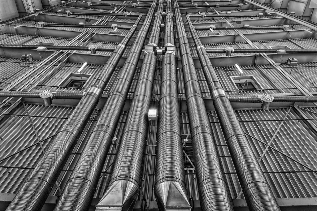 air conditioner fin cleaner spray applied to heat exchanger