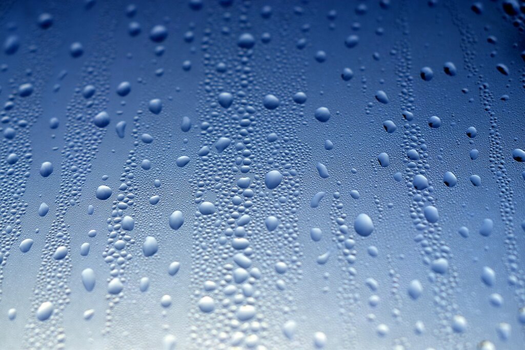 winter window condensation water drops close up